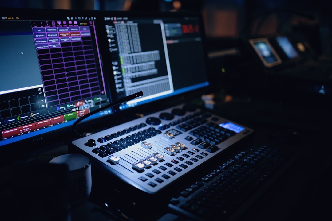 Broadcast control room with multiple monitors displaying live footage