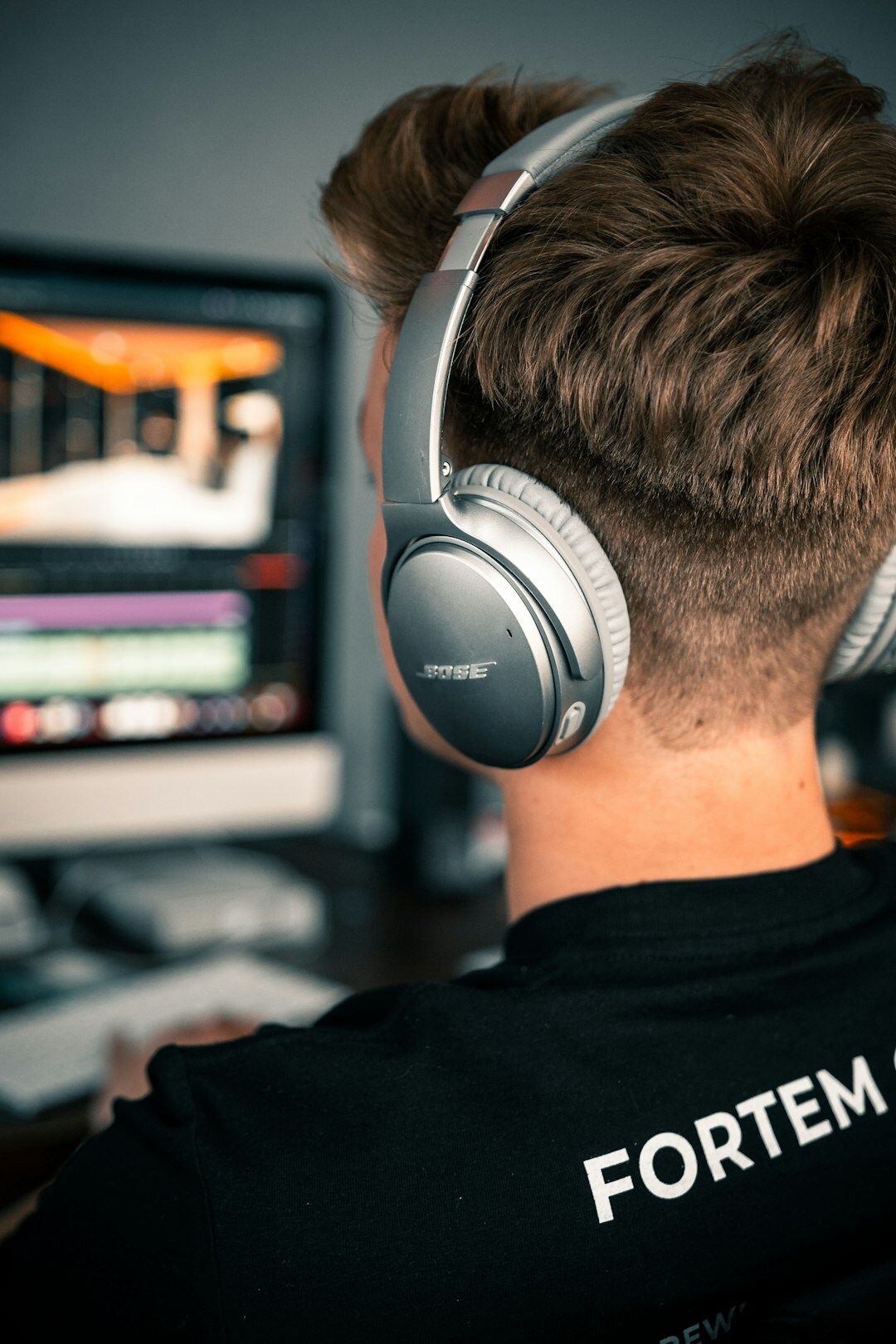 Person wearing a headset coordinating a live broadcast